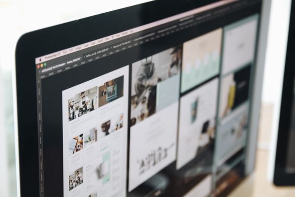 Computer screen displaying web design work